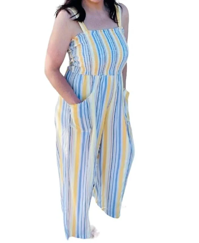 Smocked Jumpsuit In Yellow And Blue Stripes